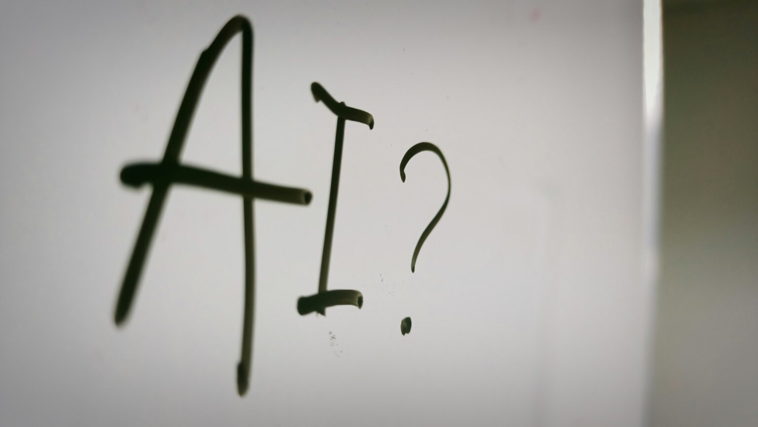 White House Pushes Early Access to Frontier AI Models in New Executive Order AI written on a whiteboard.