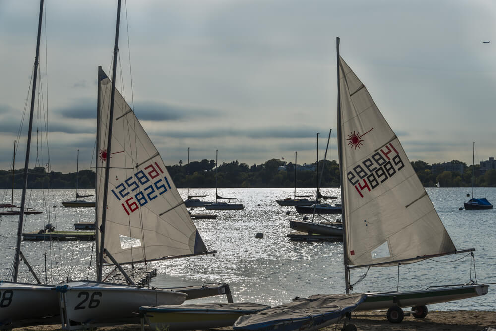 Laser sailboats moored along the shore of Lake Minnetonka near Minneapolis, Minnesota.