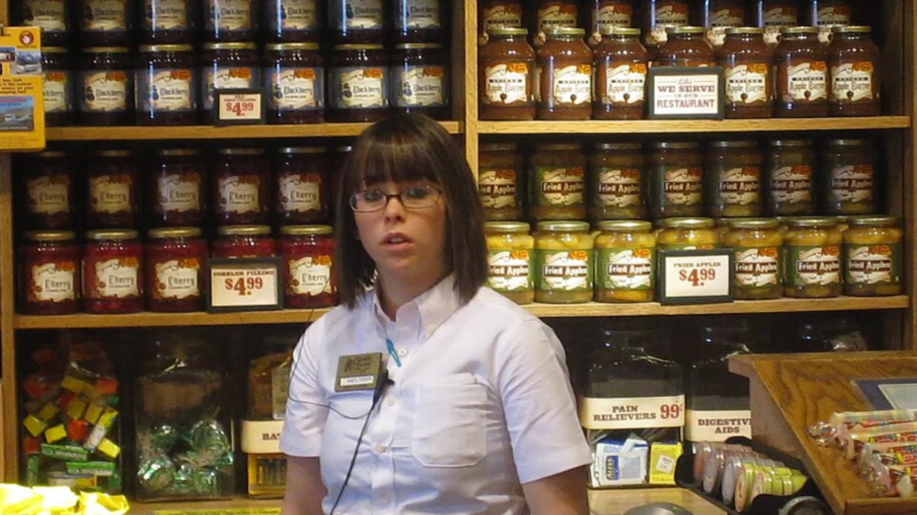 Employee inside Cracker Barrel.