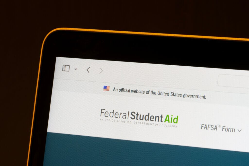 Federal Student Aid website displaying the FAFSA form on a laptop screen.