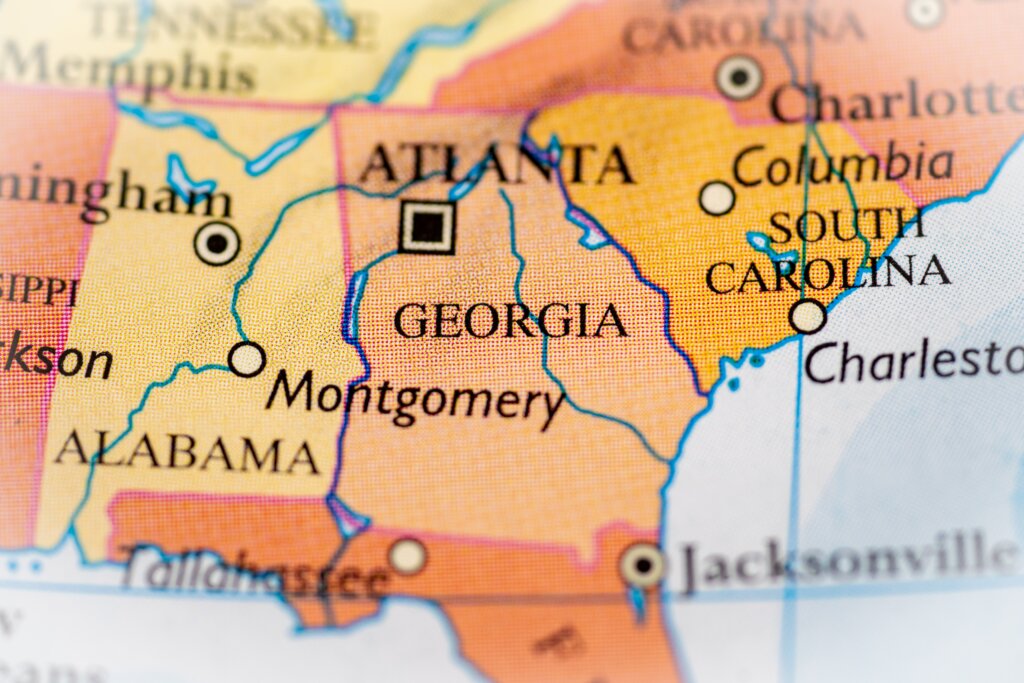 A close-up map highlights the state of Georgia and its capital, Atlanta, representing the state's healthcare system and regional rankings.