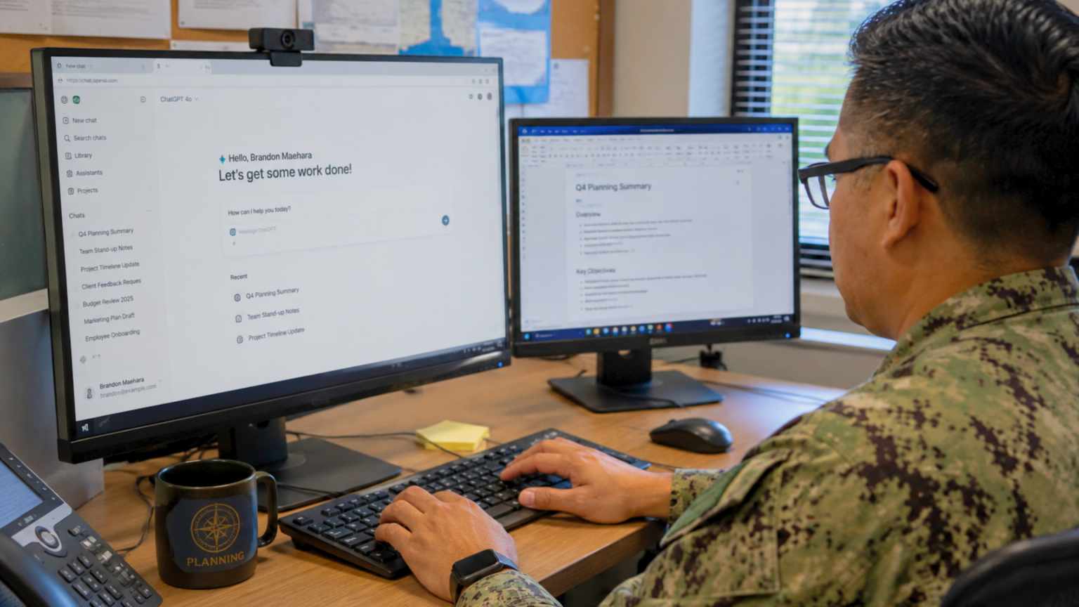 A Pentagon Photo Went Viral Over One AI Prompt A person in a military uniform typing on a computer keyboard while using ChatGPT at a desk setup.