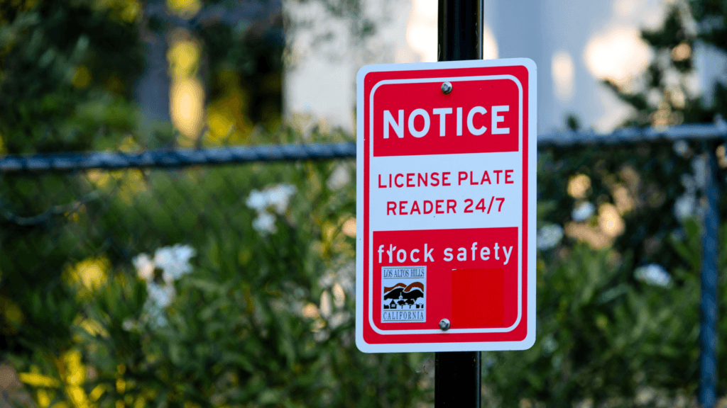 Notice sign for a 24/7 license plate reader.