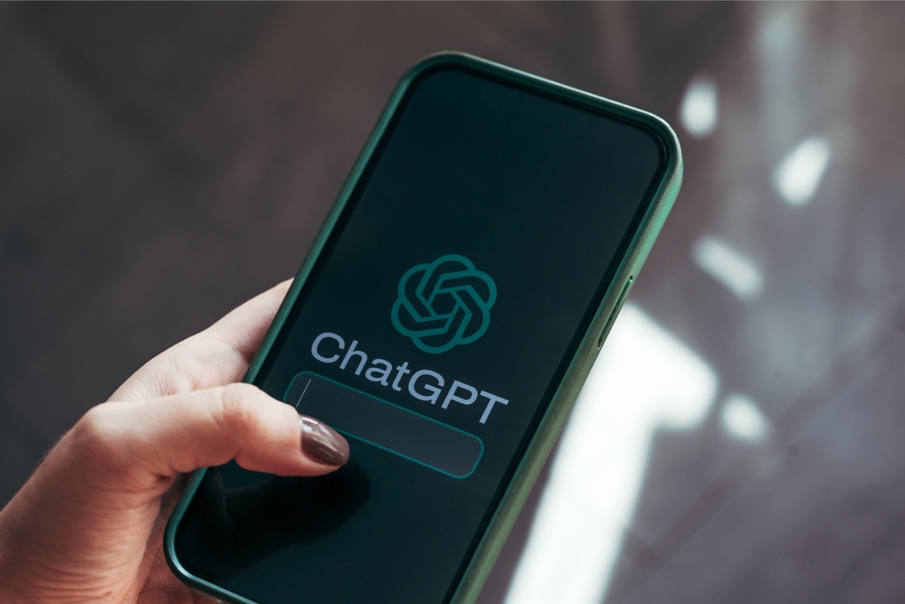 Smartphone displaying the ChatGPT logo and interface.