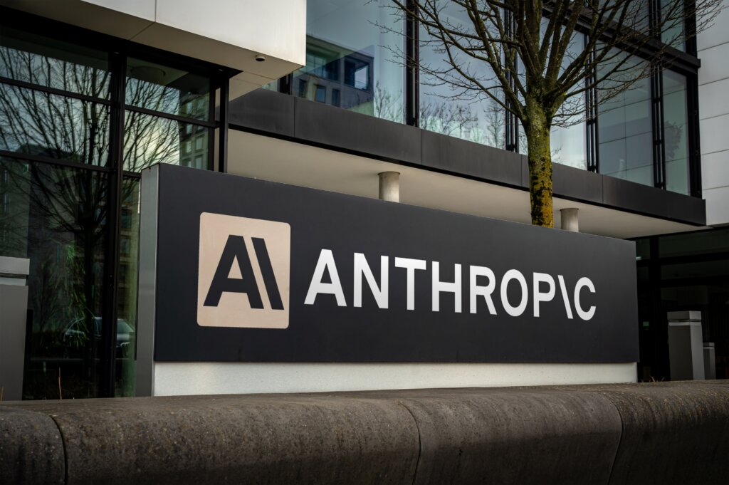 Anthropic sign outside a modern office building.