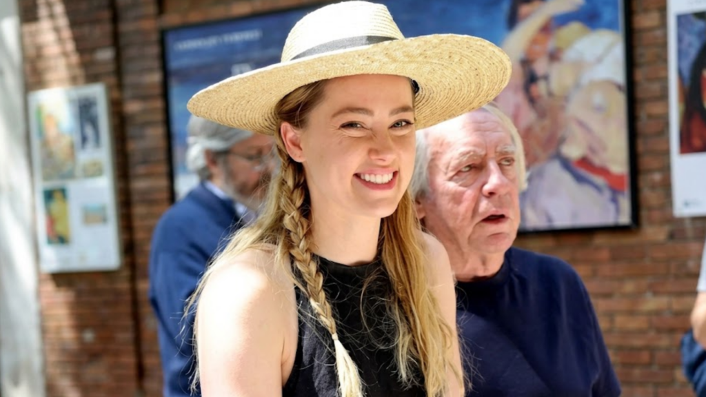 Amber Heard Smiles While Stepping Out in Madrid After Moving Overseas Post-Trial