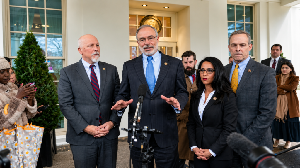 U.S. Representative Andy Harris speaking at a press conference outside the White House alongside fellow politicians.
