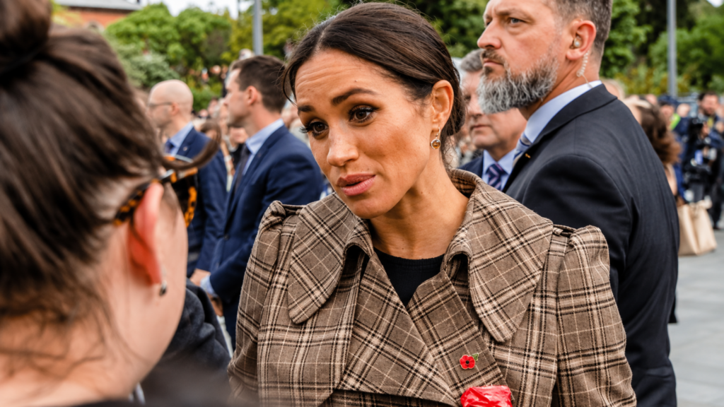 Meghan, Duchess of Sussex, talking with members of the public during a royal walkabout.