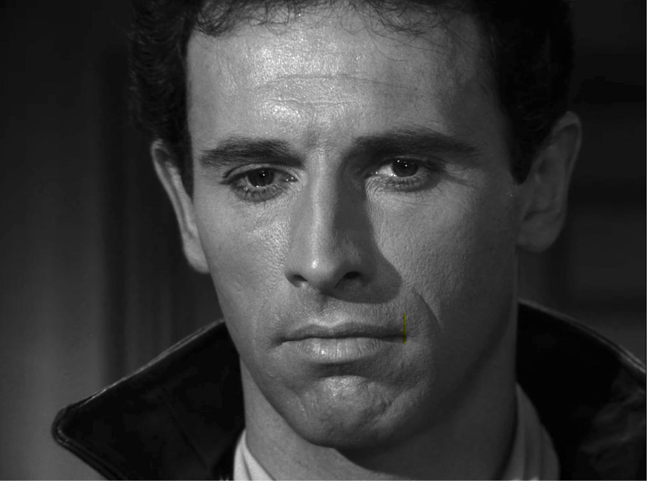Black-and-white close-up of Michael Forest in an episode of The Twilight Zone.